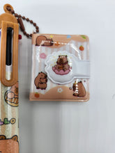 Load image into Gallery viewer, Capy Bara 6 Multi-Color Pen With Mini Key Chain Notebook
